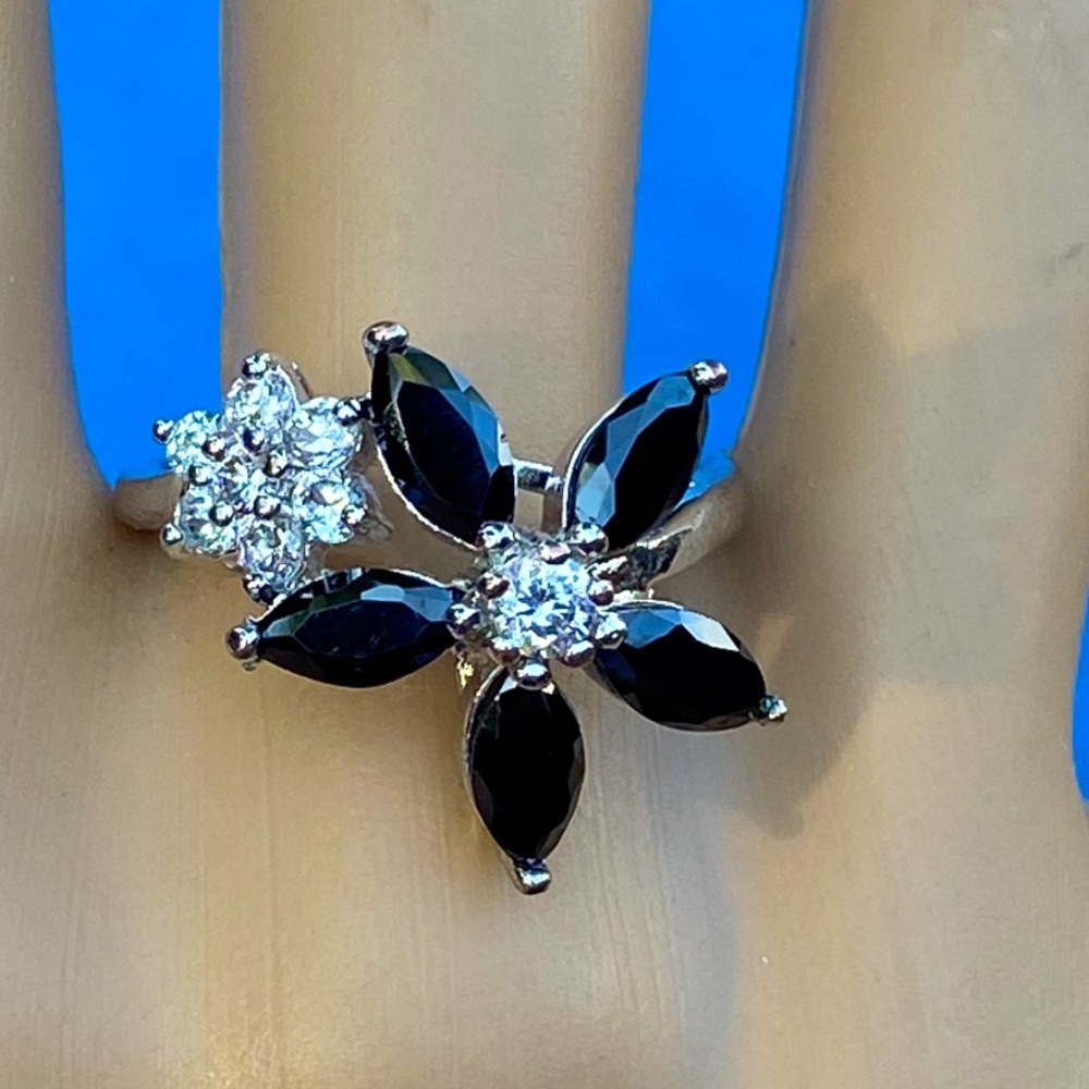 C19:  Beautiful ring & Diamond sparkle- flower is Marquis gems- sapphires ??